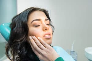 gum sores above teeth