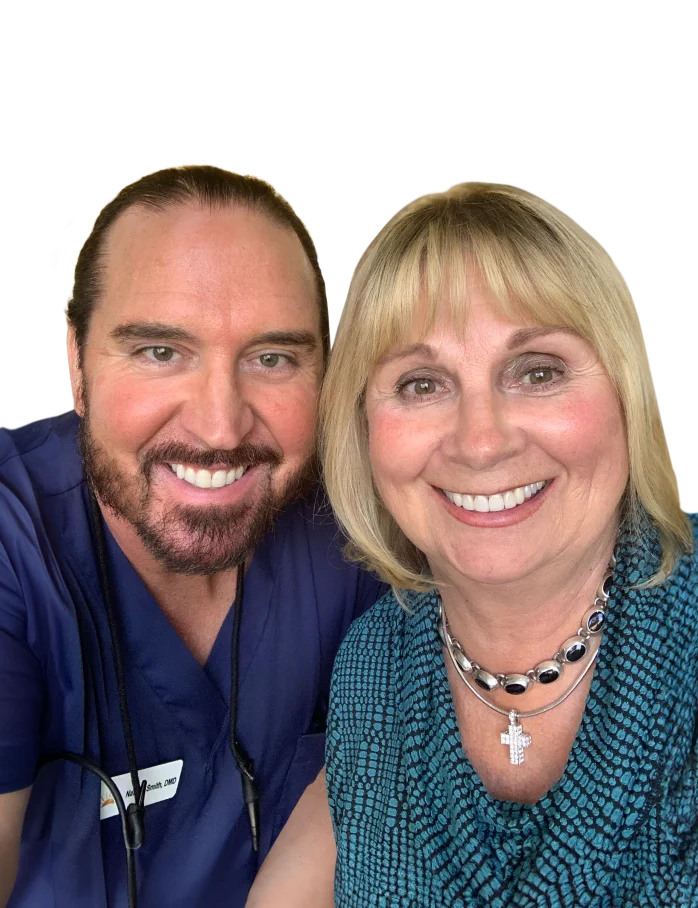 Dr Smith and his patient after new crowns placed