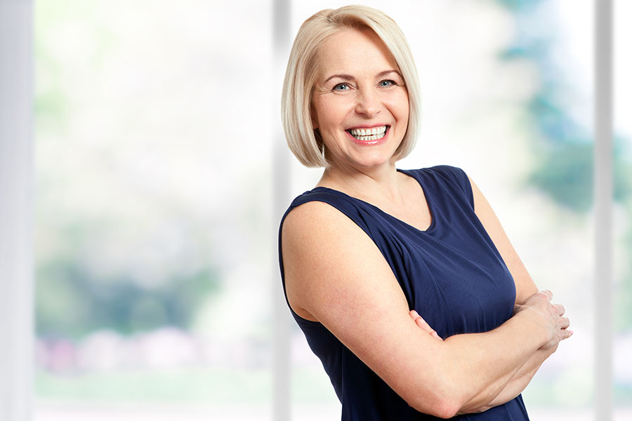 When to Choose Dental Implants Over Bridges - Featured Image